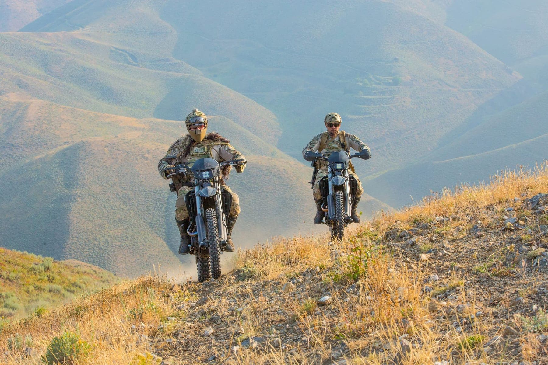 Operator riding a tactical motorcycle